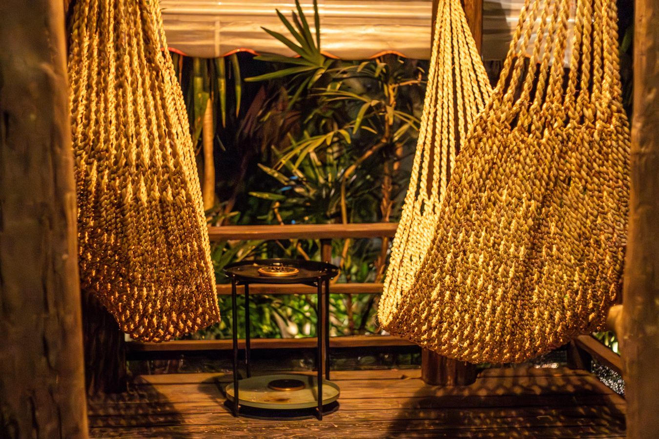 Golden hammocks in tropical paradise setting