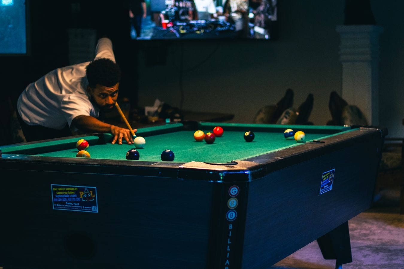 Customer playing pool