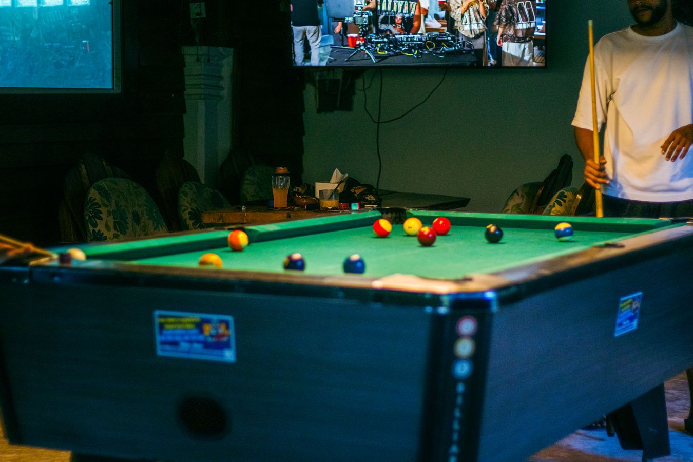 Pool table and gaming area at Magical Weed Garden