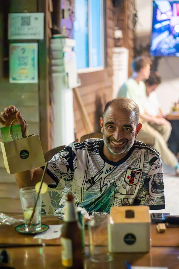 Smiling customer at table